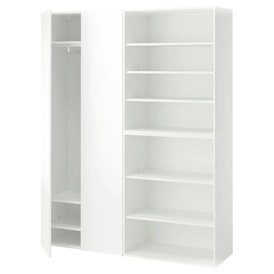 Two tall white modular storage units with empty shelves and compartments for versatile use.