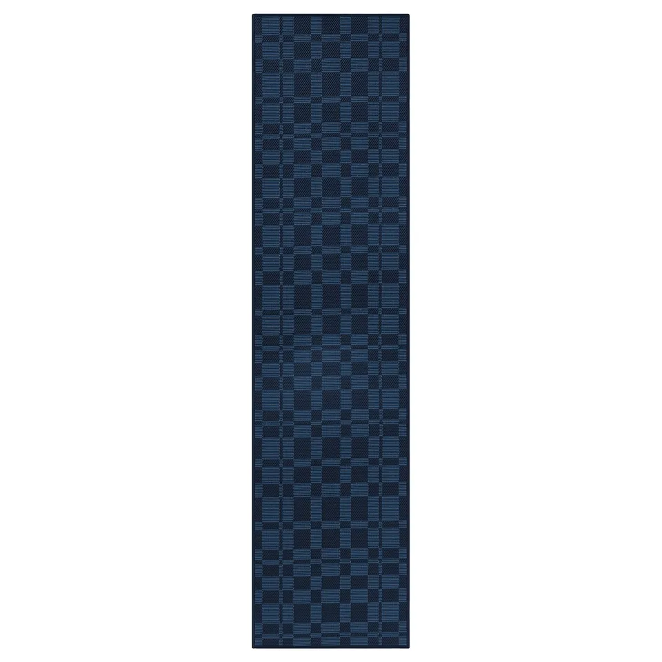 A blue NATTÅG rectangular runner rug with a chequered pattern.