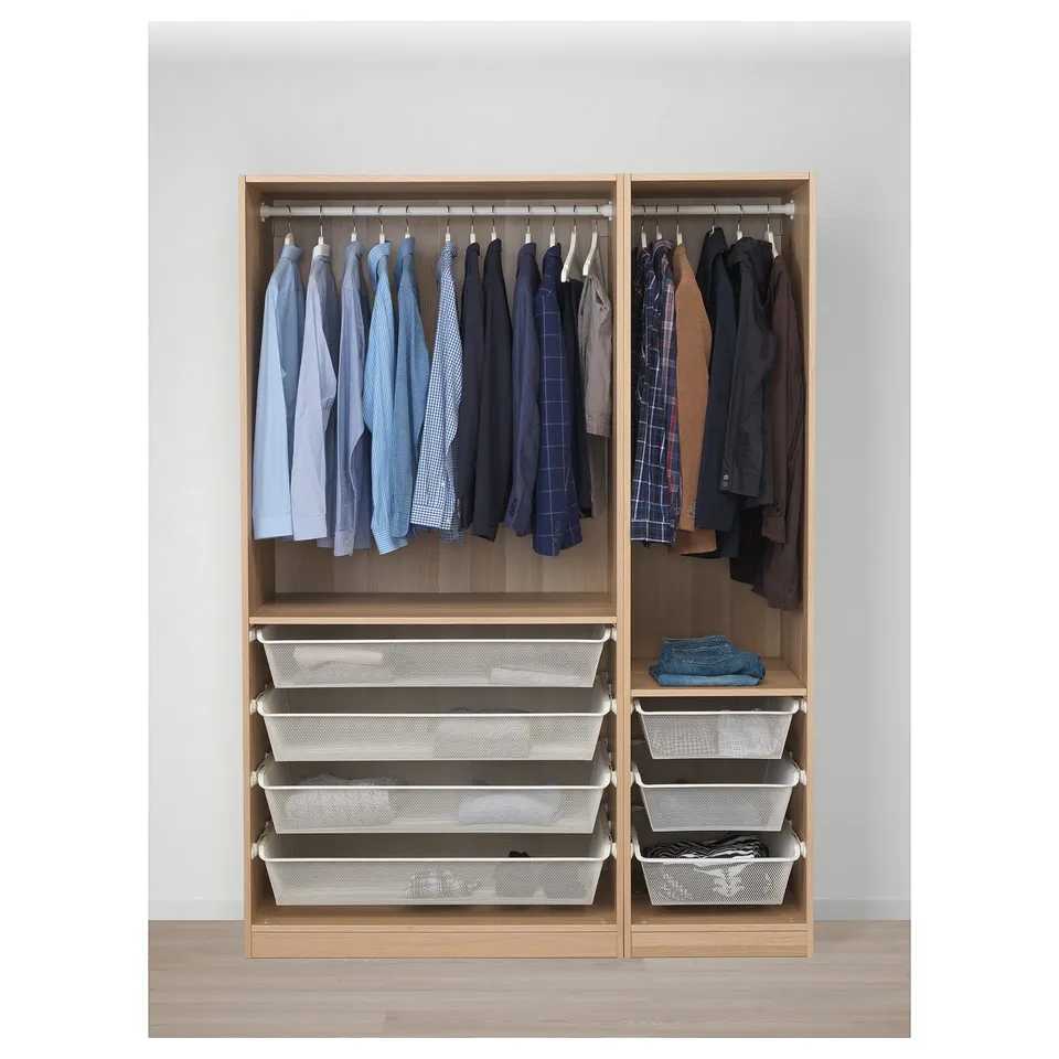Wooden wardrobe with metal mesh drawers, hanging shirts, and jackets. Adjustable feet and dampened hinges.