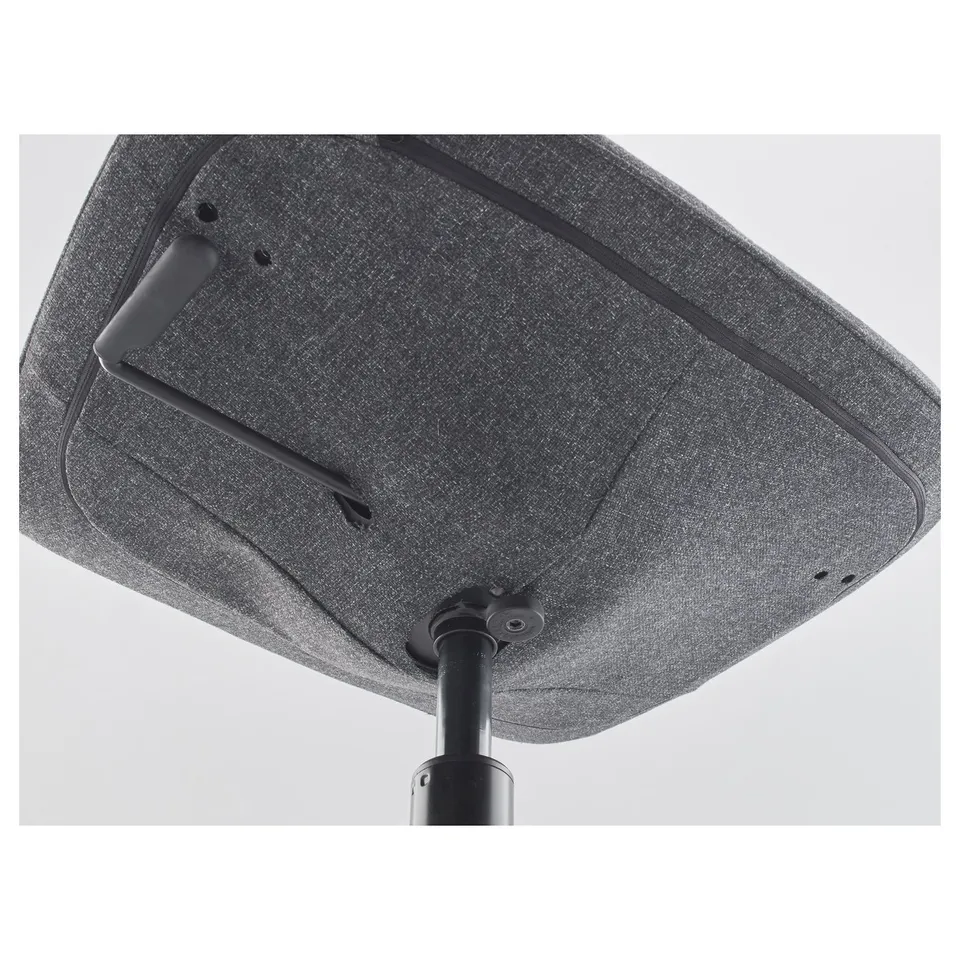 A modern office chairs underside, highlighting its robust construction and adjustable.