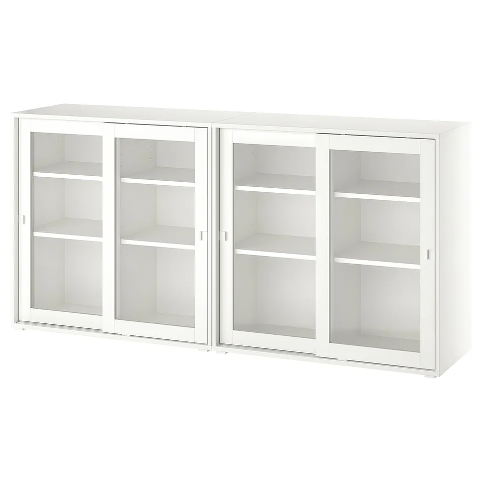A white VIHALS cabinet with glass doors. It three sections, each with adjustable shelves.