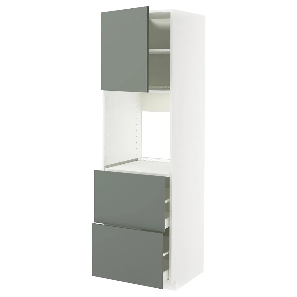 Ikea METOD kitchen cabinet with gray-green drawers and shelves.