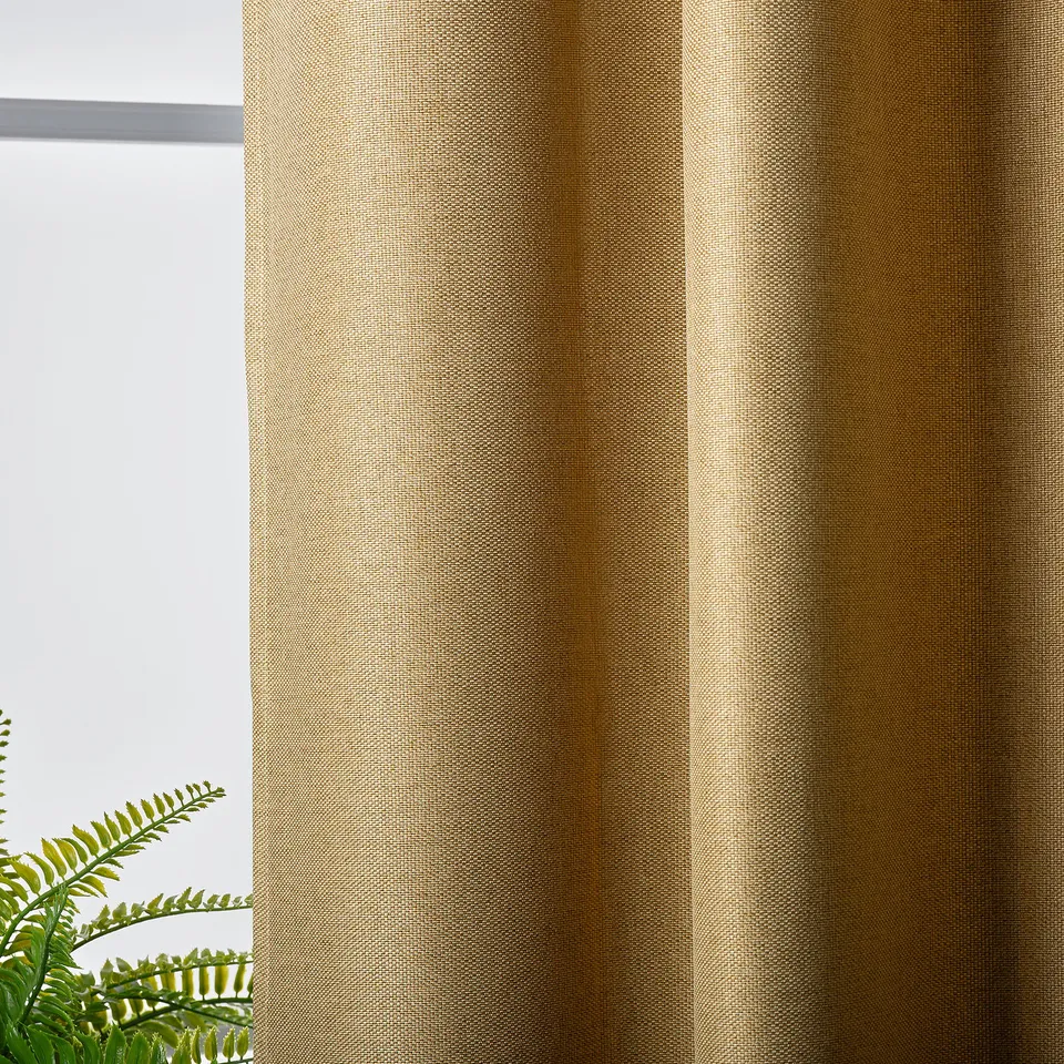 Room-darkening curtains in textured fabric, natural colour, hanging from ceiling to floor, covering window, adding privacy and style.
