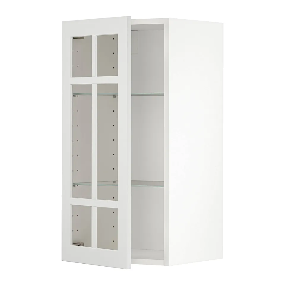 White METOD kitchen cabinet with glass doors and adjustable shelves.