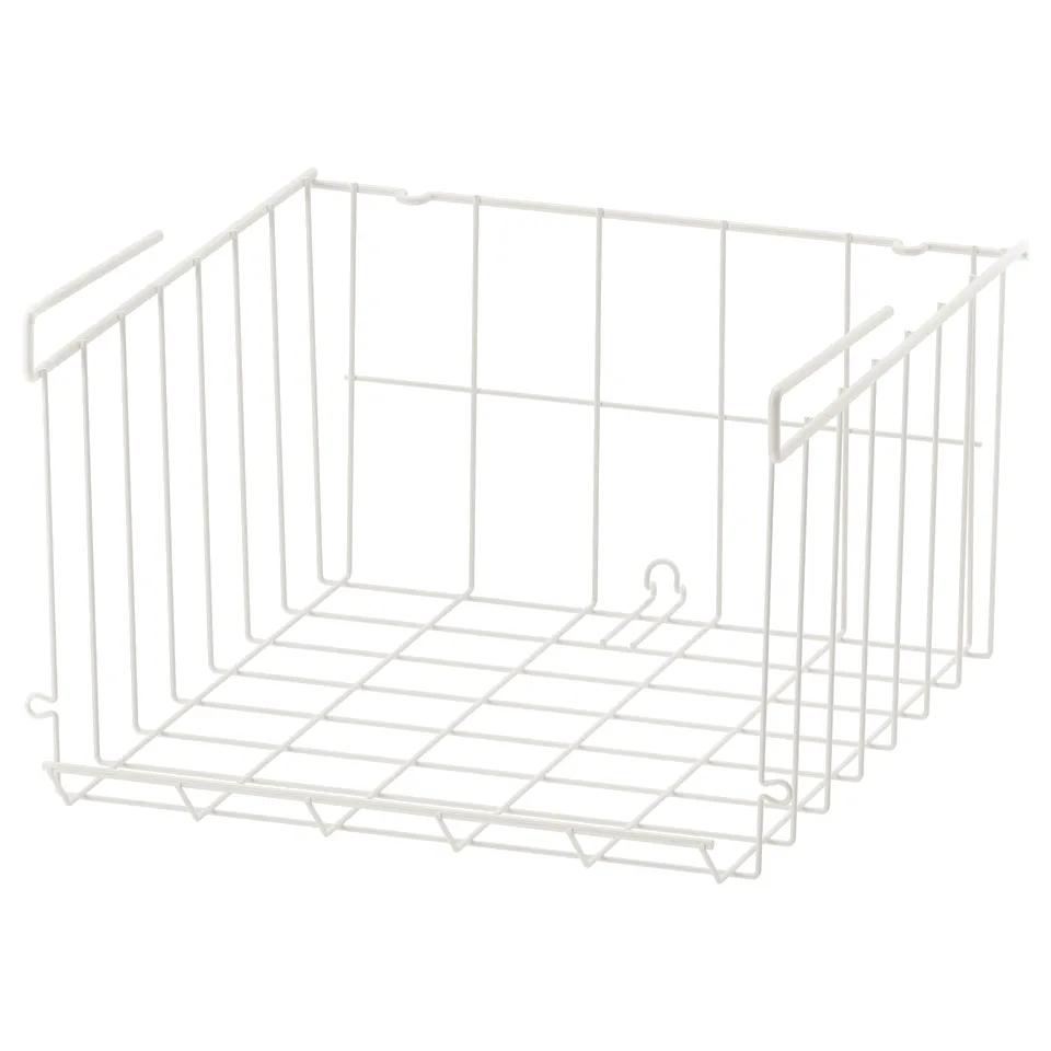 A white wire storage basket named OBSERVATÖR. It has an open square design and is made from powder-coated steel. Ideal for organising items.