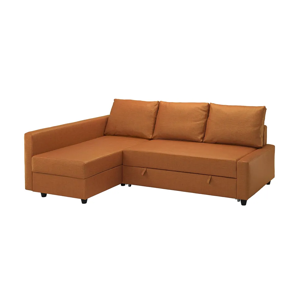 FRIHETEN orange l-shaped sofa-bed with storage and comfy cushions.