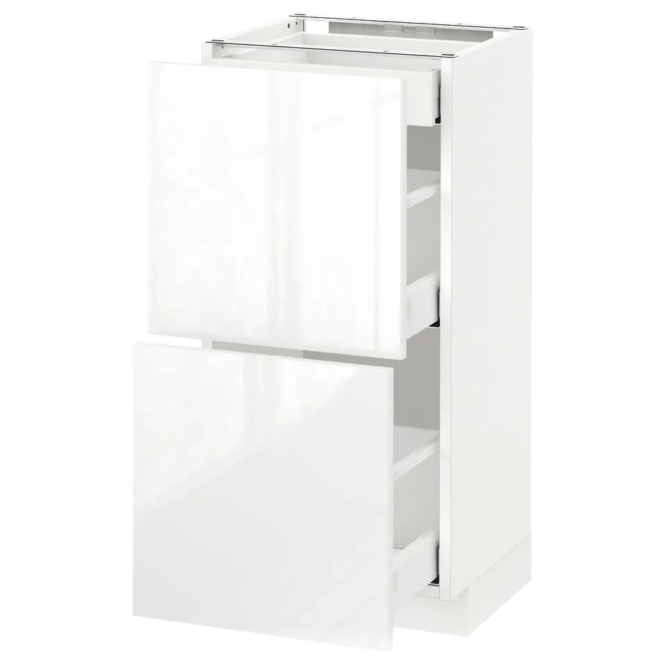 White modern kitchen cabinet with glossy finish and multiple drawers.