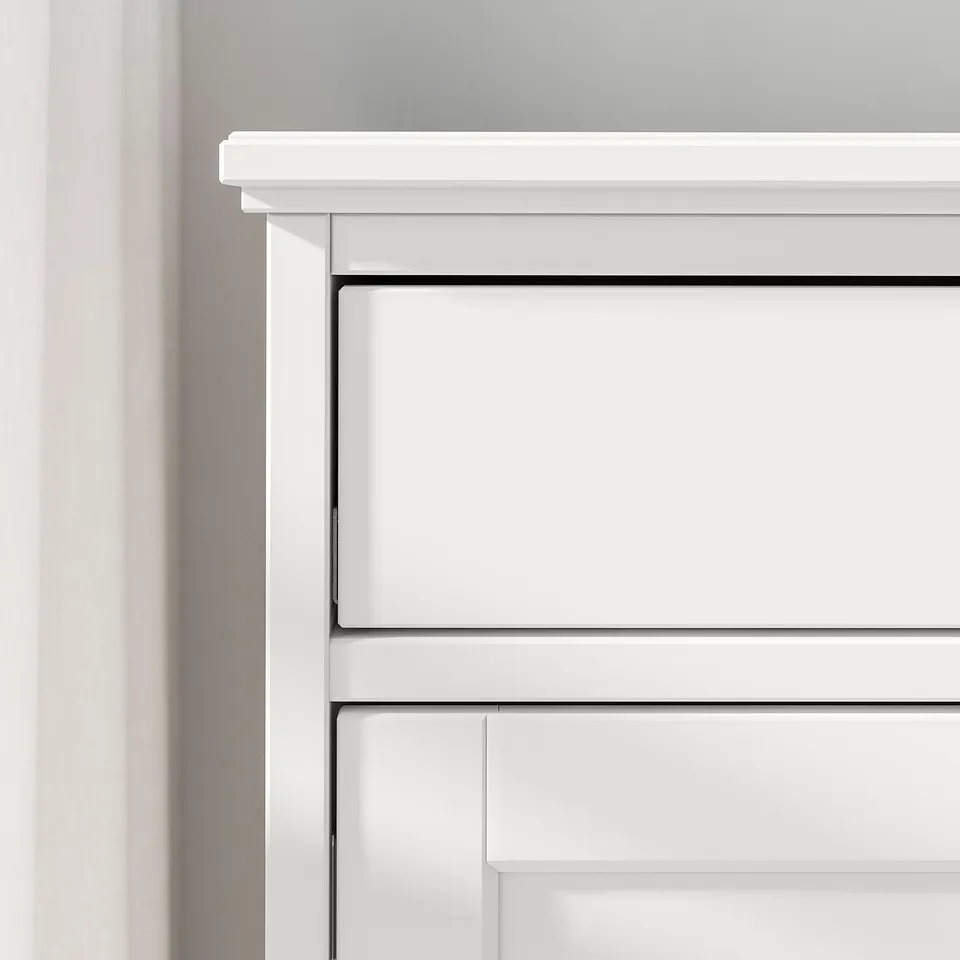 White modern sideboard with folding doors.