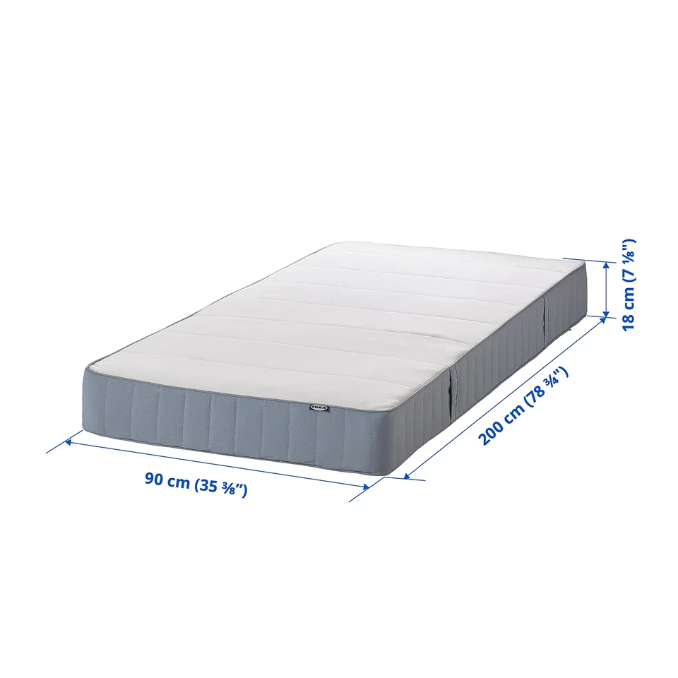 IKEA VESTMARKA mattress, white, rectangular, firm bonnell springs, foam top, grey side handles.