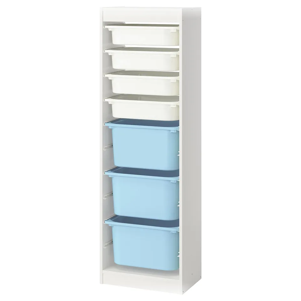 A white TROFAST storage unit with blue and white bins arranged vertically.