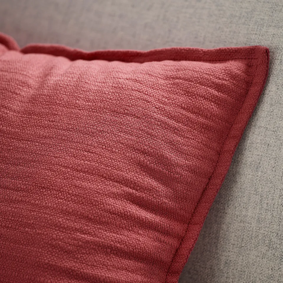 Pink-red LAGERPOPPEL cushion cover with textured surface, zip, recycled polyester.