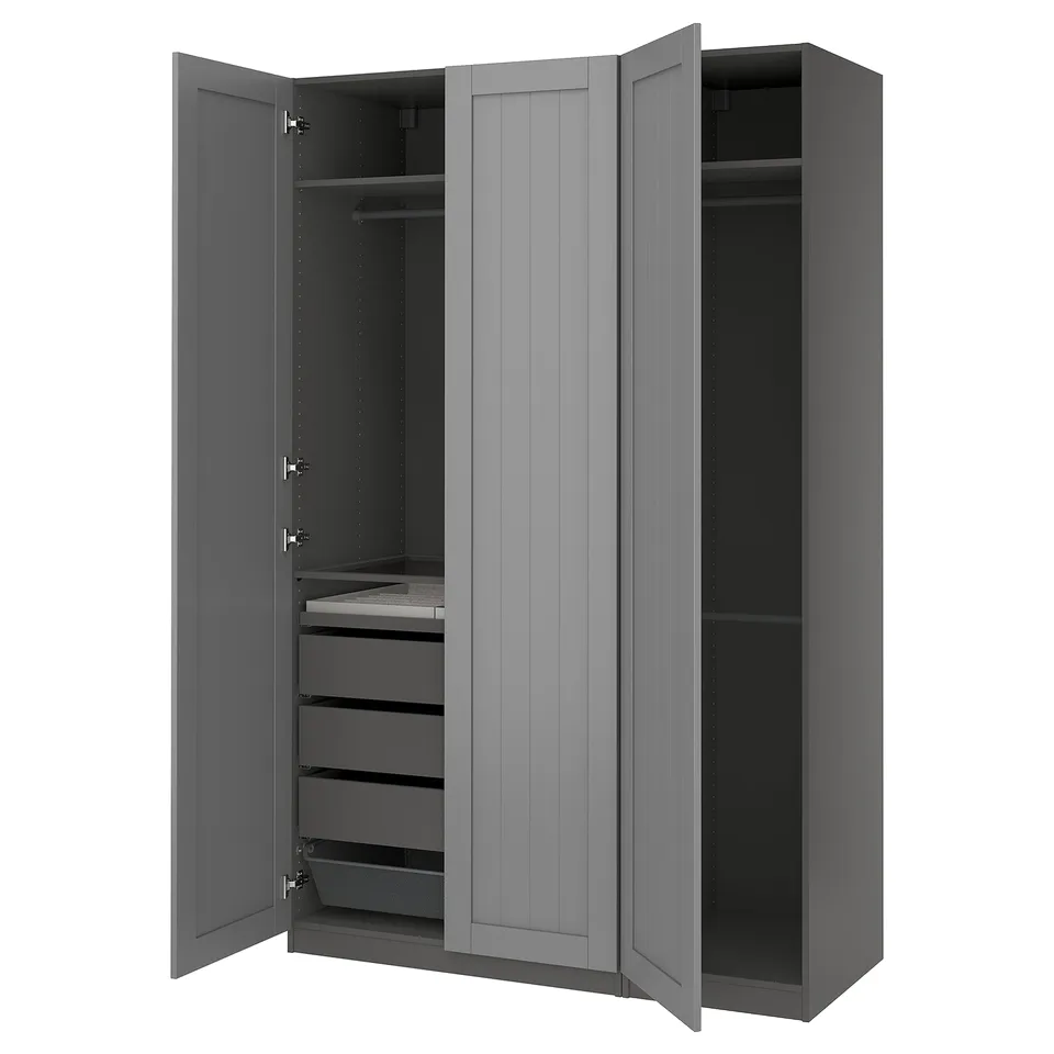 A grey PAX wardrobe with open doors, revealing drawers and shelves inside.