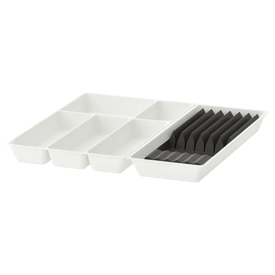 White UPPDATERA cutlery organisers, with one having separate slots and the other for knives.