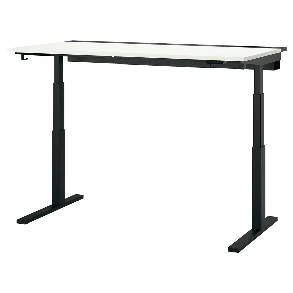 The MITTZON standing desk a sleek black underframe with adjustable legs and a light-colored rectangular top.