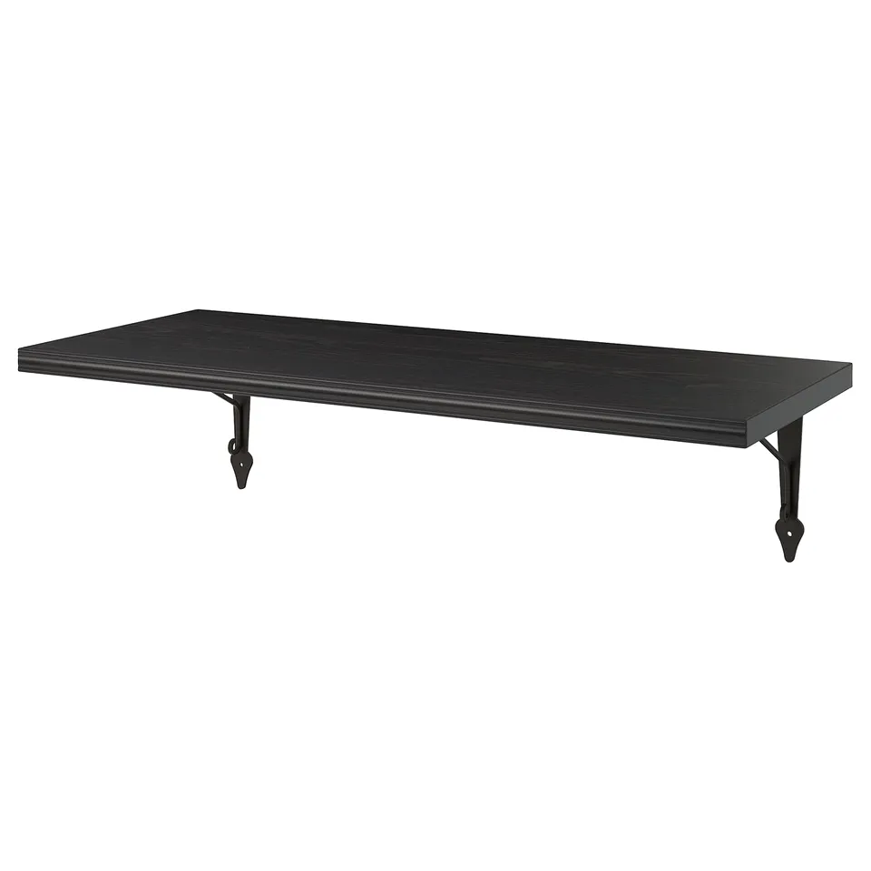 A black BERGSHULT wall shelf, made of particleboard and steel, with a sleek, rectangular design.