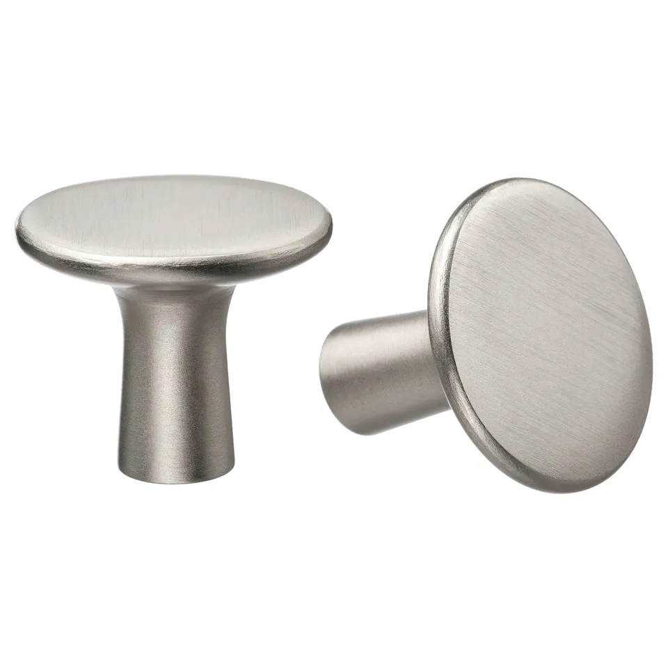 Two modern, brushed nickel, round knobs with slim stems, shown side by side.