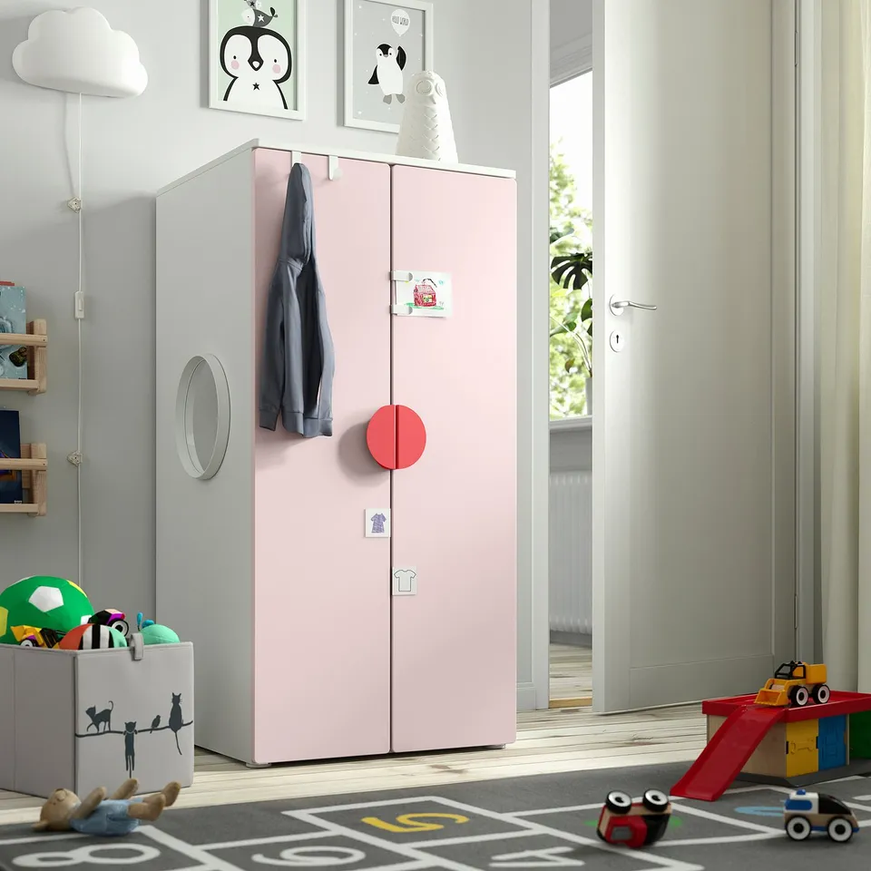 Pink SMÅSTAD kids wardrobe with grey doors, adjustable, functional for childrens rooms.