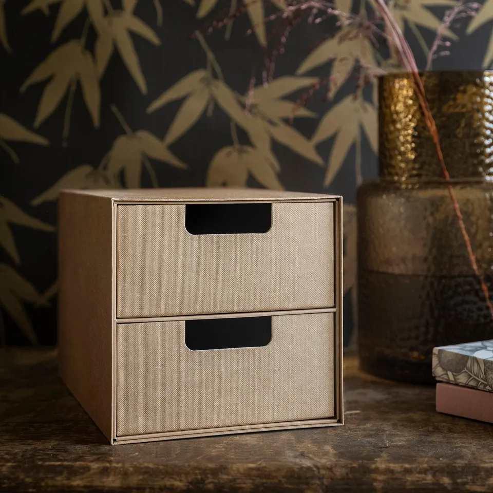 Two-drawer organiser on table with handles, ideal for small items.