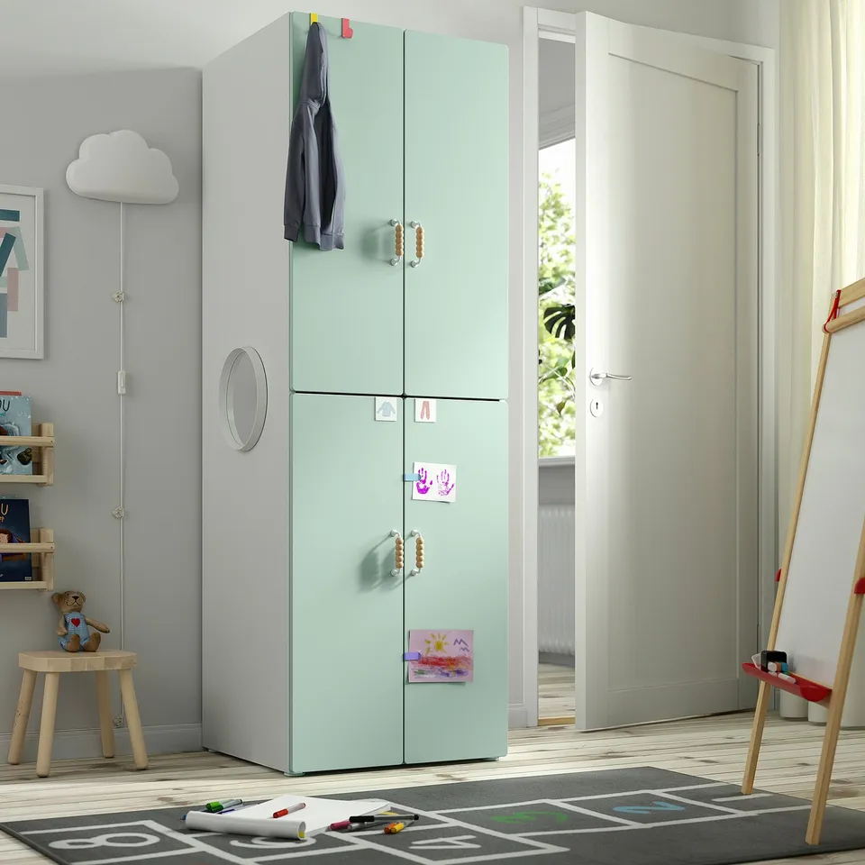 Green SMÅSTAD wardrobe with wooden handles and notes