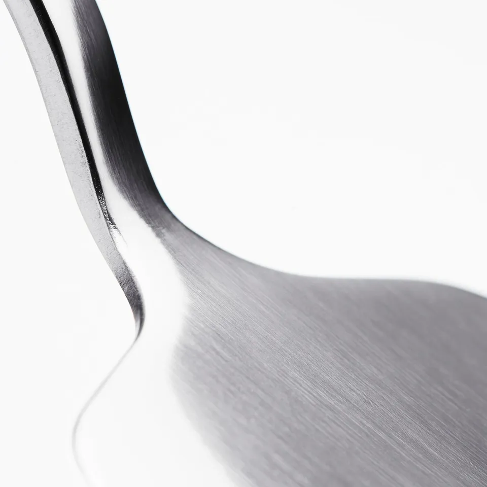 Stainless steel cake-slicer with smooth, sharp edge.