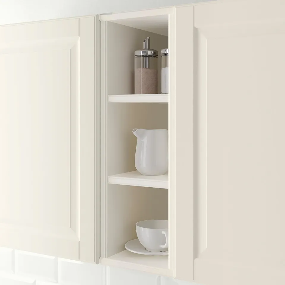 Kitchen open cabinet displays items, fits narrow spaces.
