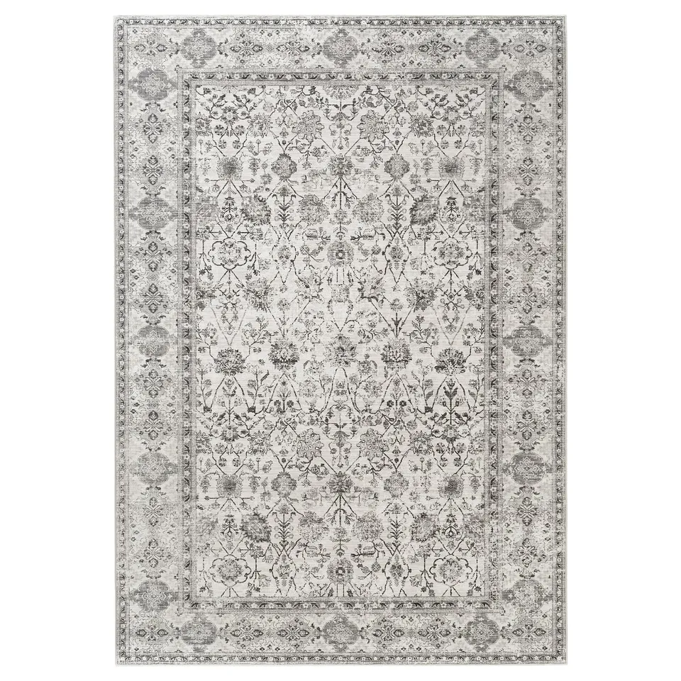 Black and white patterned rug with floral and geometric designs, rectangle, recycled polyester and synthetic rubber.