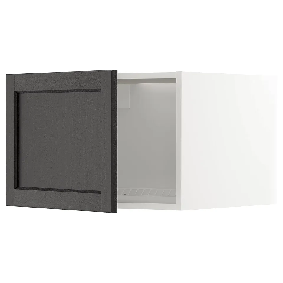 A dark gray ikea METOD kitchen cabinet with a wooden door open, revealing the interior space.