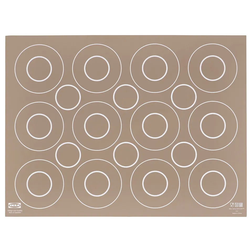 Ikea baking mat, brown, silicone, circular patterns, rectangular shape.