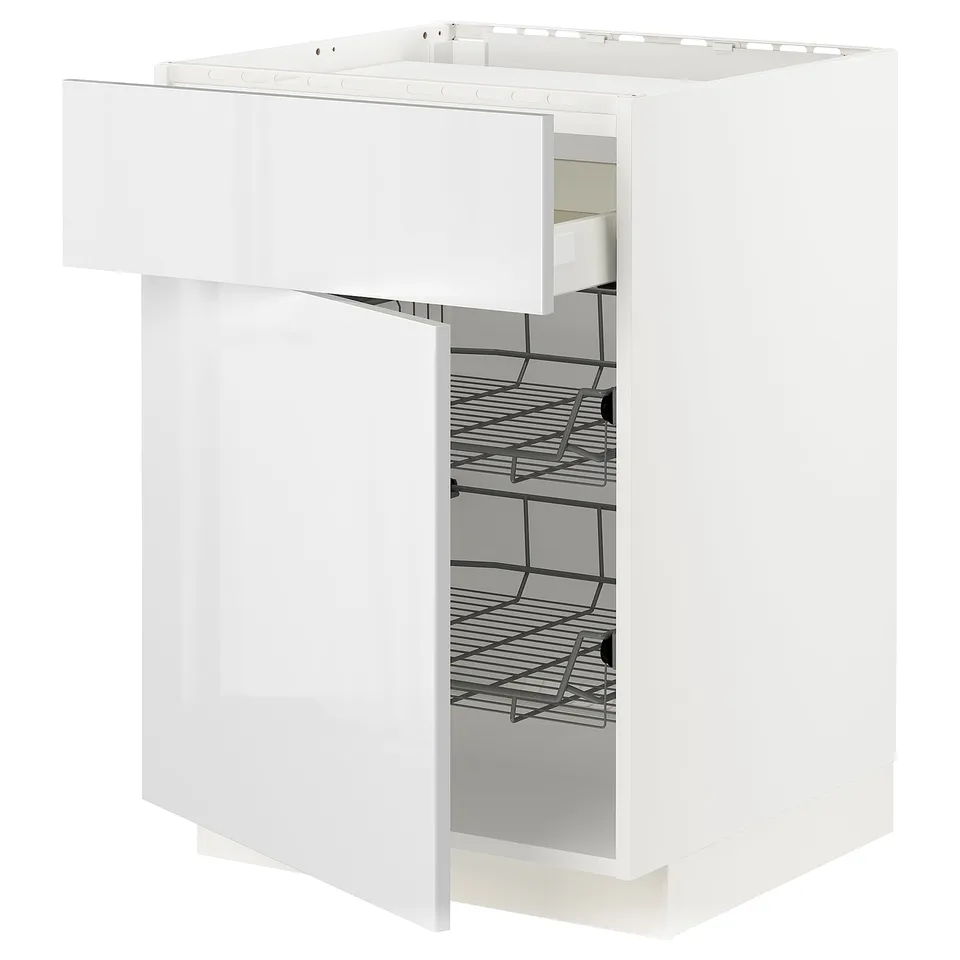 White kitchen cabinet with pull-out wire basket.
