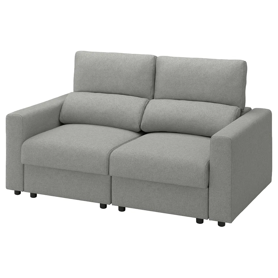 A grey malmkoping sofa with a modern design and adjustable headrests, perfect for lounging.