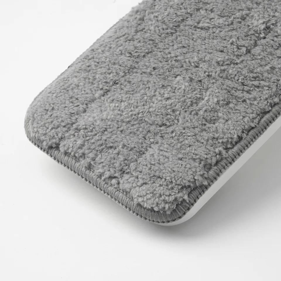 Grey microfiber cleaning pad, soft texture, crochet edges, laid flat.