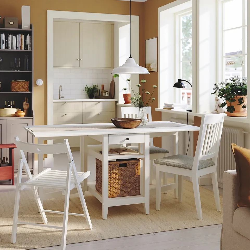 Modern dining set with storage in bright room.