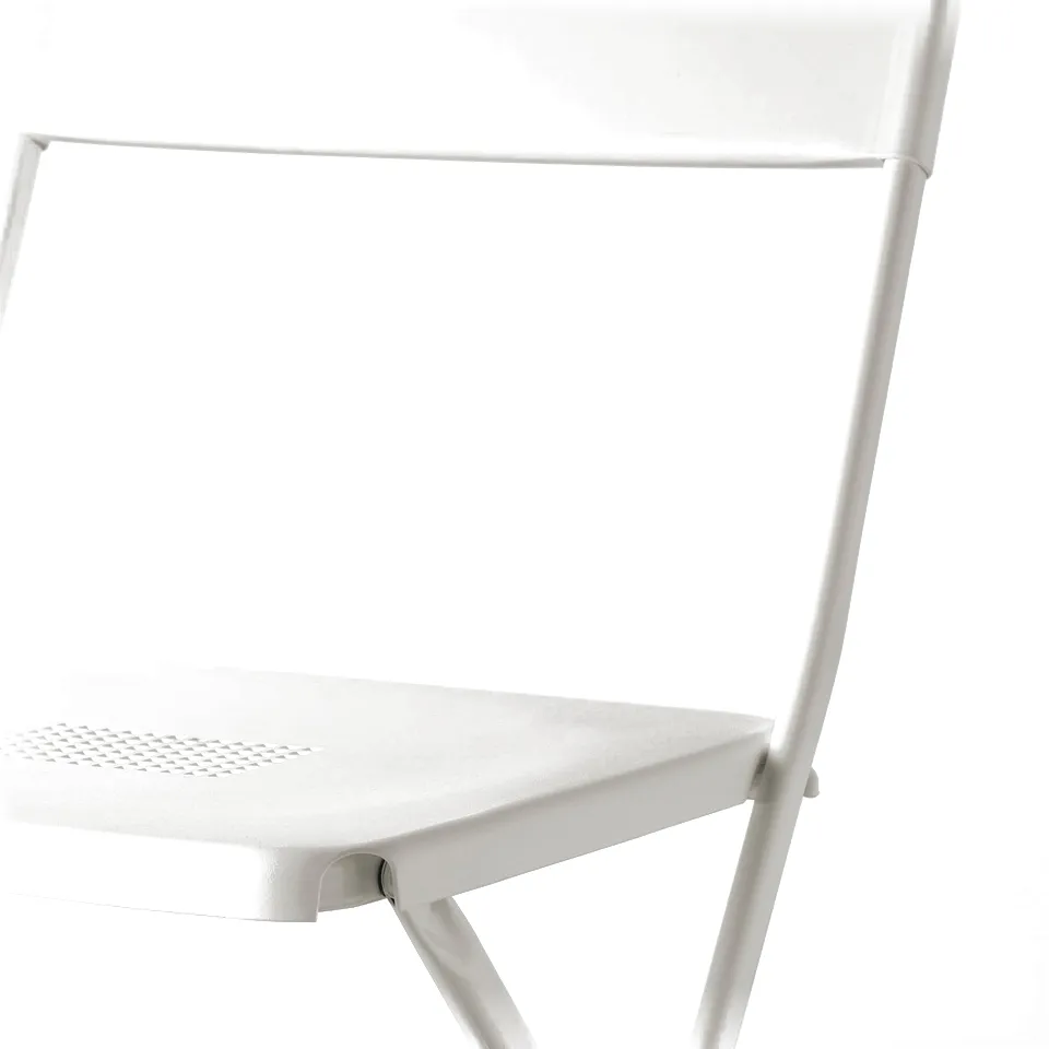 Foldable chair shown, made of durable steel and plastic, lightweight and slim, ideal for small spaces.