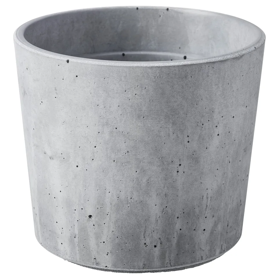 Round grey concrete planter with small specks, soft base, suitable for indoor/outdoor use.