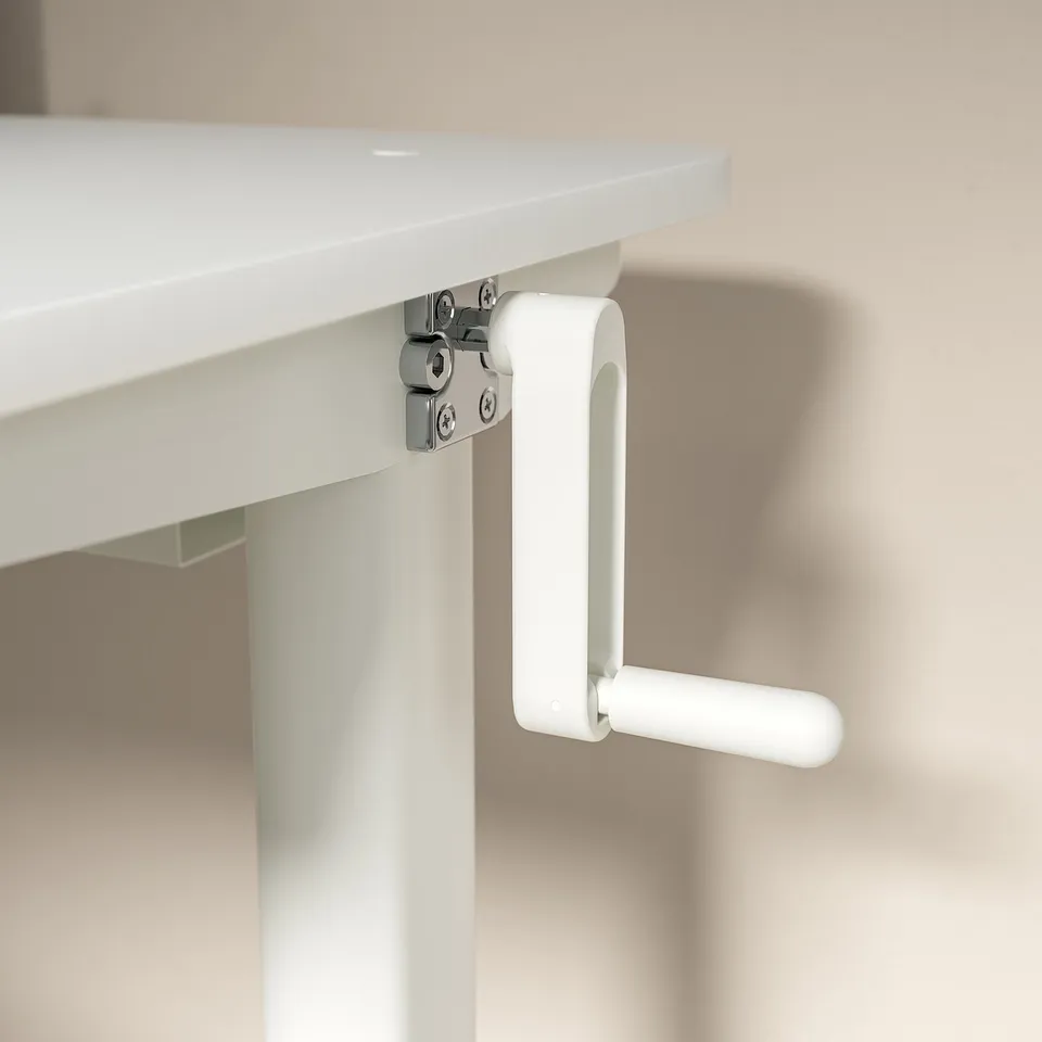 White adjustable crank desk with metal hardware.
