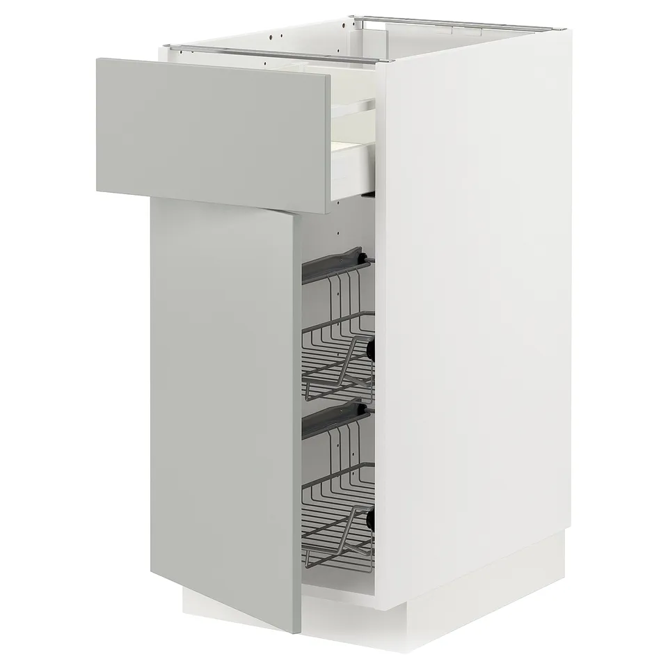White METOD kitchen cabinet with wire basket drawers, modern design.