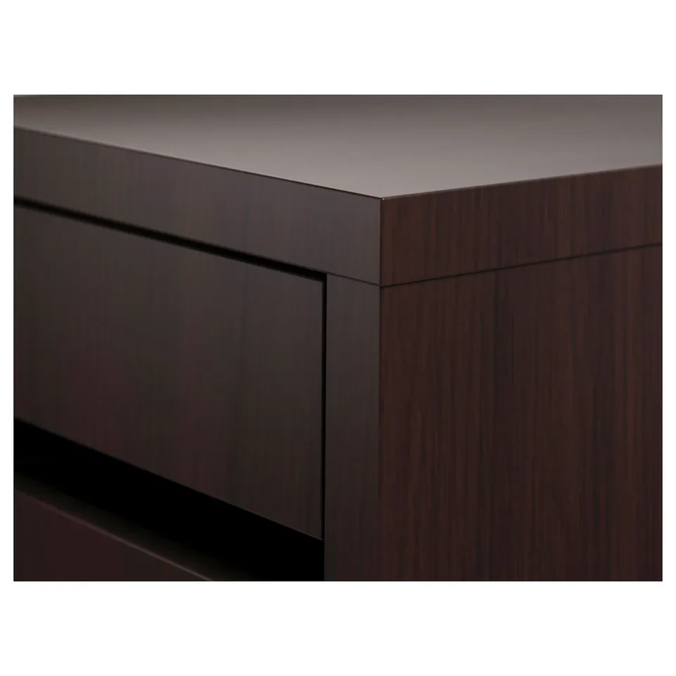 Dark wooden desk with smooth surfaces and sleek edges, showcasing high-quality craftsmanship.