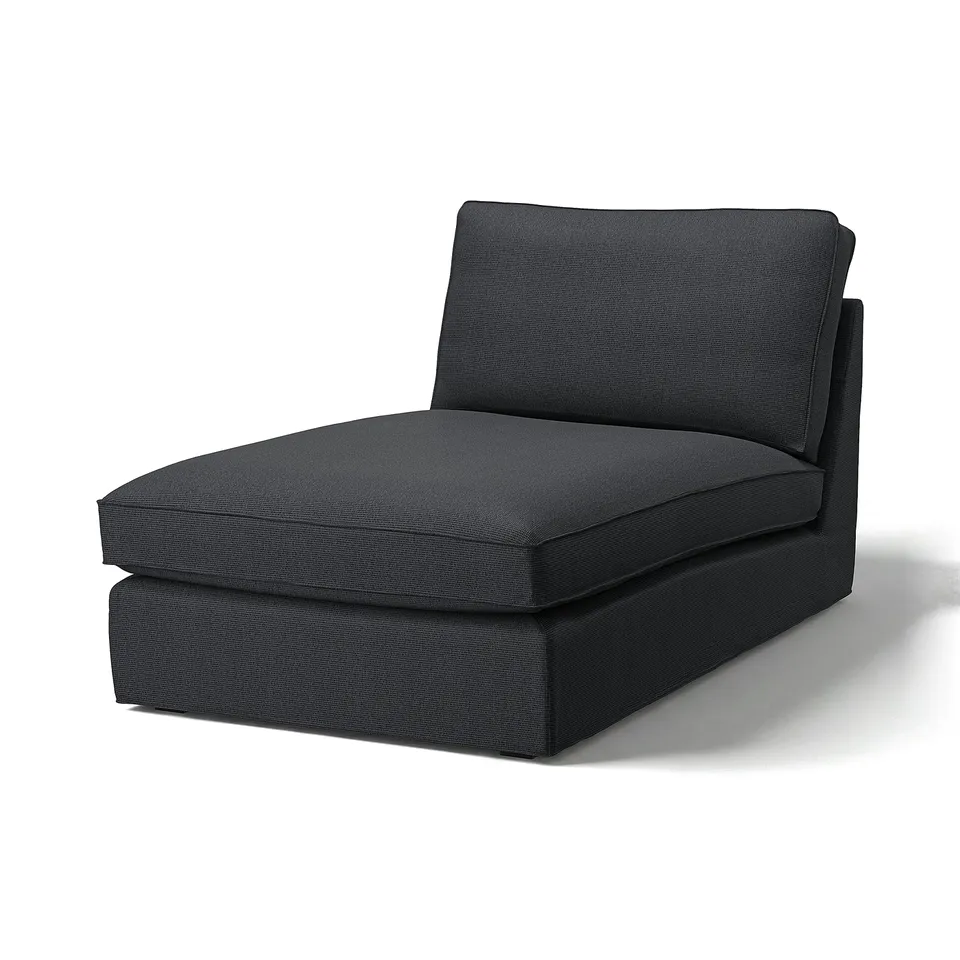 A KIVIK black fabric chaise lounge in modern, minimalist design. Soft, rounded shape; made from recycled polyester and cotton.