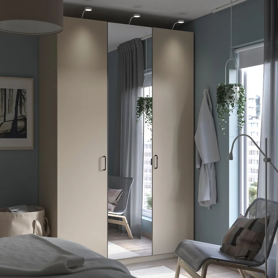 Modern bedroom with PAX wardrobes and minimalist decor