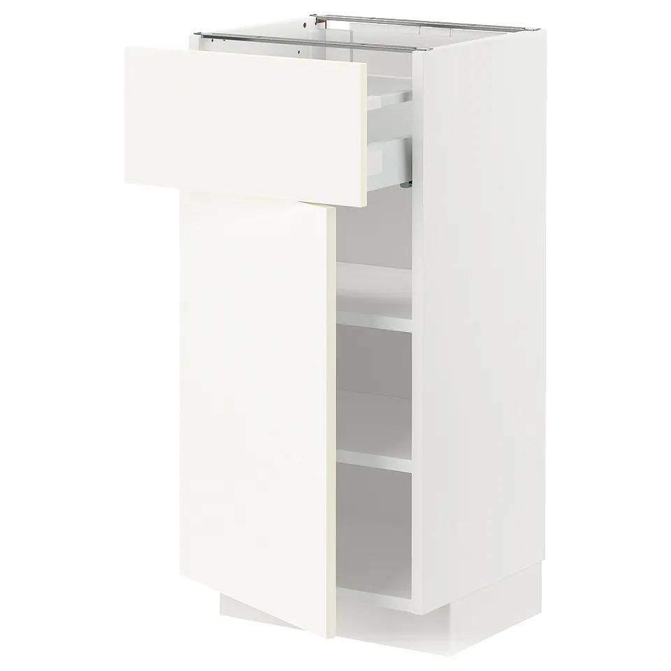 White METOD kitchen cabinet with adjustable shelves and soft-close drawers.