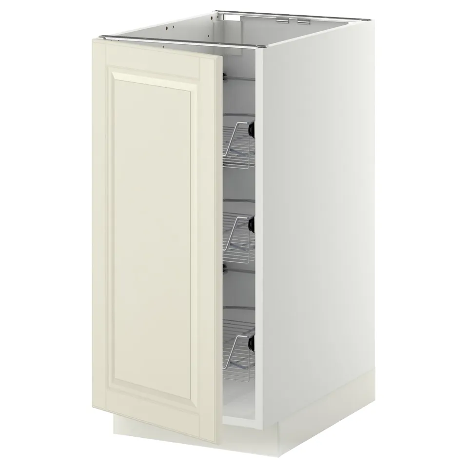 A white METOD kitchen cabinet with an off-white door and wire baskets.