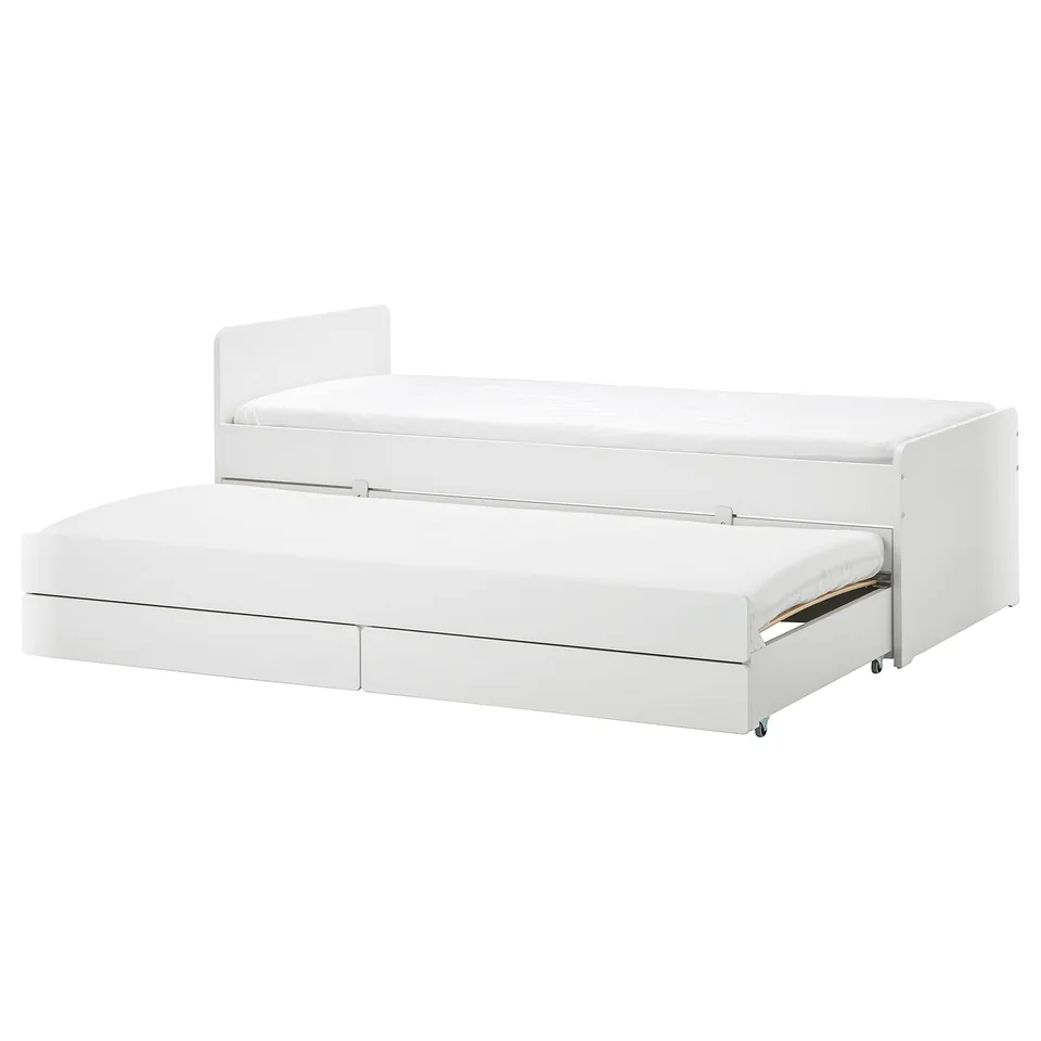 White SLÄKT kids bed with trundle, rounded corners, drawers, modern look.