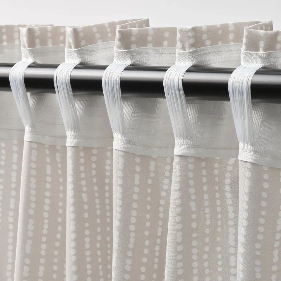 MÄSTERROT dot curtains let in daylight, provide privacy, easy pleats with hooks.