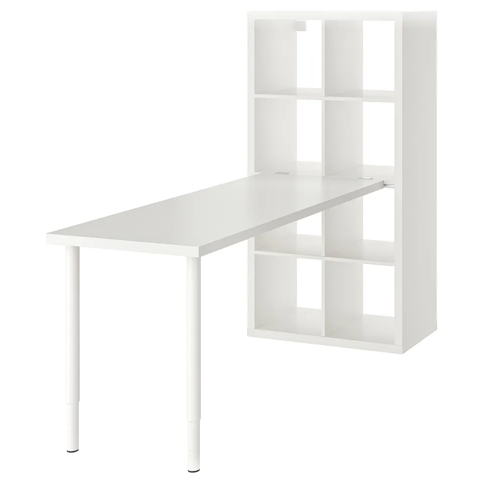 A white KALLAX shelving unit with an attached desk. Its a space-saving, adjustable design with open and closed storage compartments.