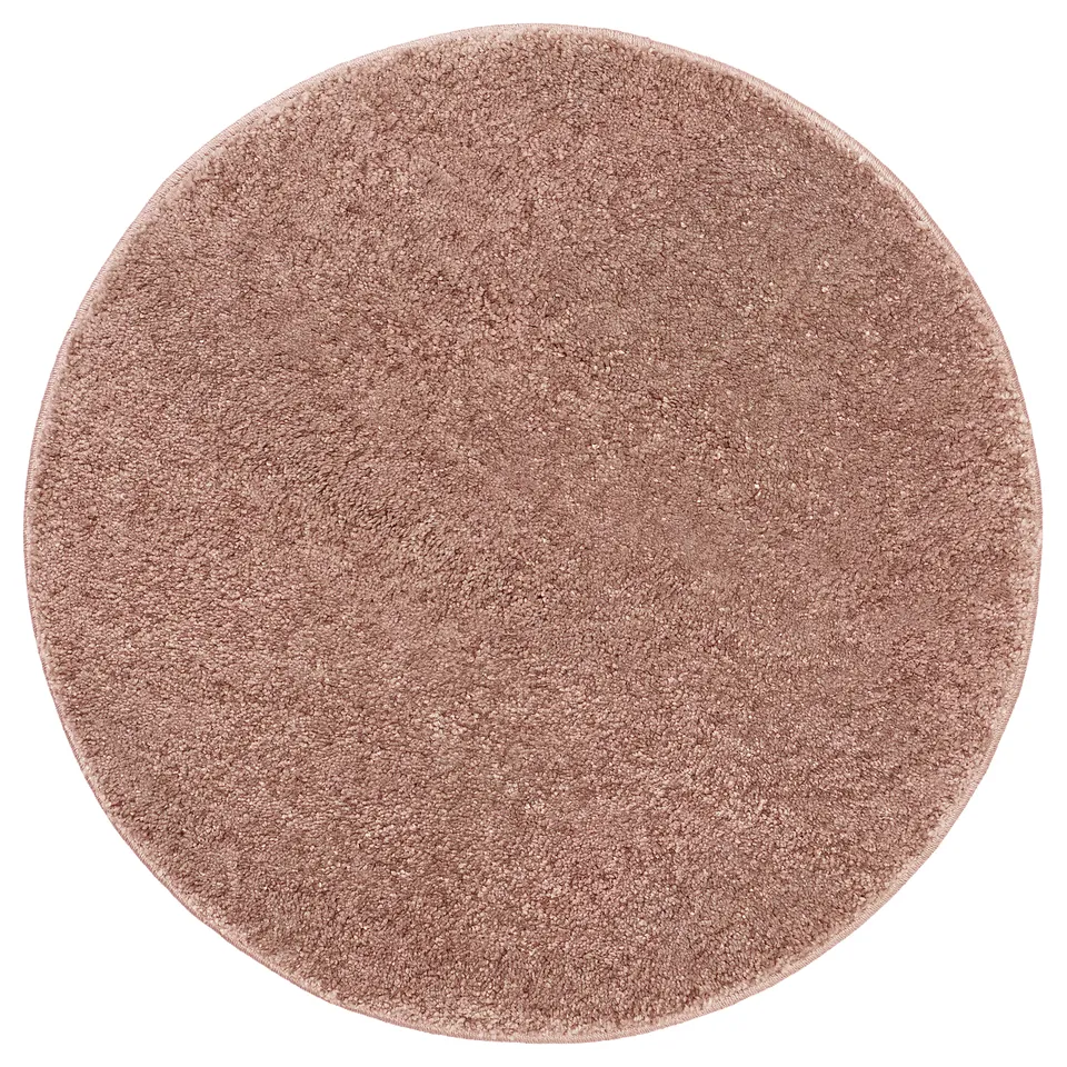 Round, pale pink rug, soft texture, 100% polypropylene, low pile, gentle sheen.