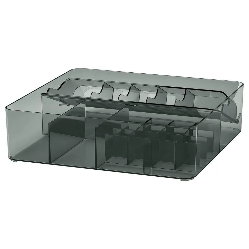 A dark grey VISSLAÅN organiser with multiple compartments for small items, made from recycled pet plastic. It has a modern, sleek design.