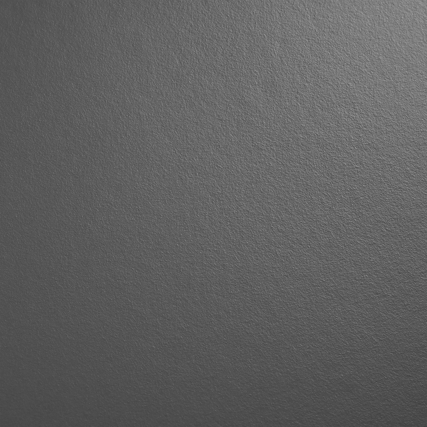 Dark grey kitchen worktop with smooth, flawless surface. Modern and sleek texture.