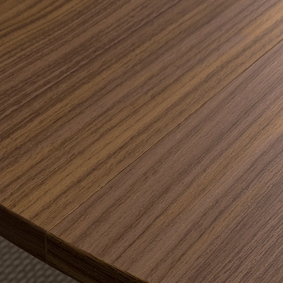 Smooth, dark-wood tabletop with visible grain texture.