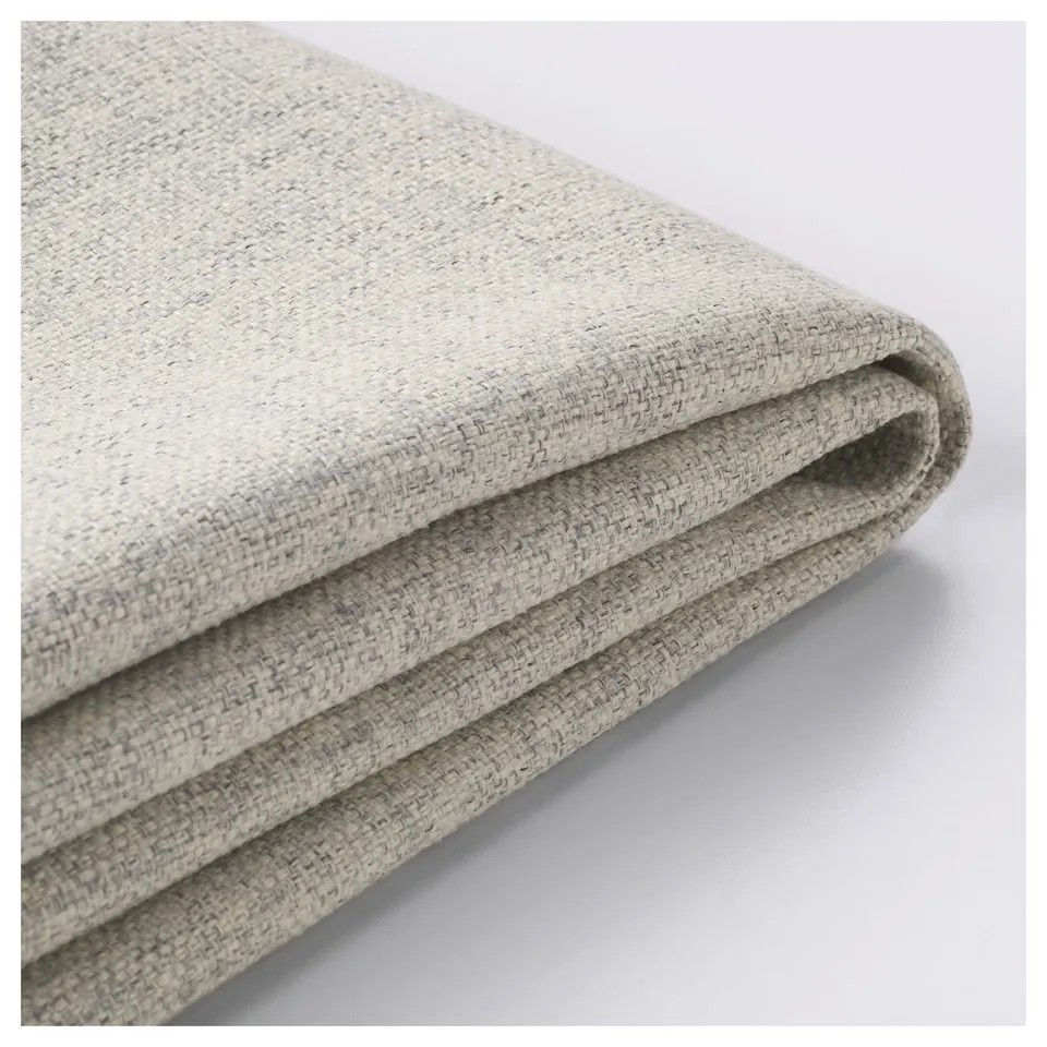 Folded beige fabric, textured, high quality. Easy to clean, durable.