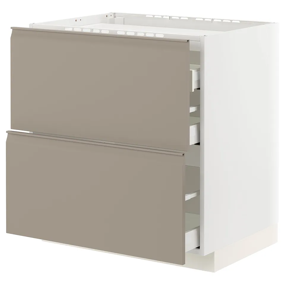 A modern, minimalist kitchen unit named METOD in beige with grey handles, featuring smooth-running drawers.